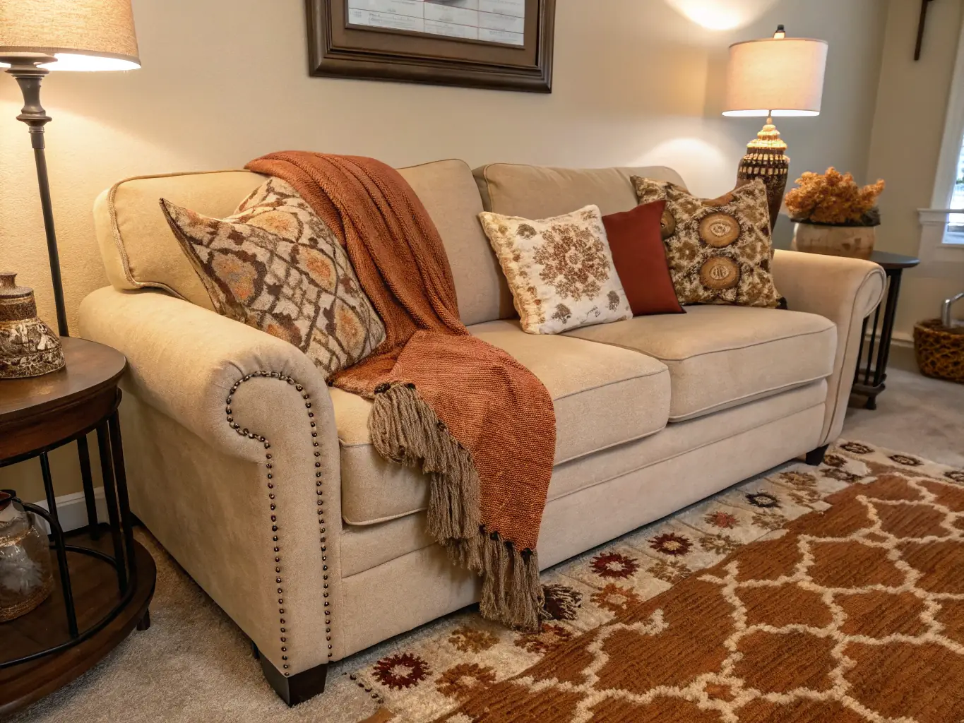 A cozy and inviting living room with comfortable seating, stylish decor, and a warm fireplace, exemplifying Decorinthus' ability to create comfortable and stylish living spaces.